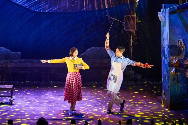 Two performers on stage in Let Me Fly